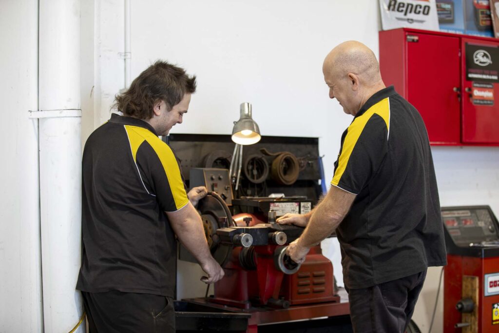Team of automotive technicians working together in Bayside garage at Pascoe Mechanical Bayside